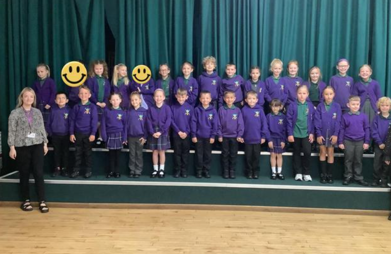 Picture of children and staff in Penguins Class